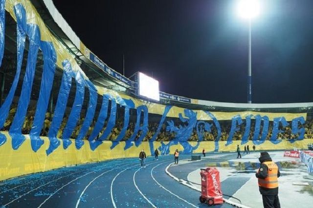 Image of a stadium with the film roll cut into a design